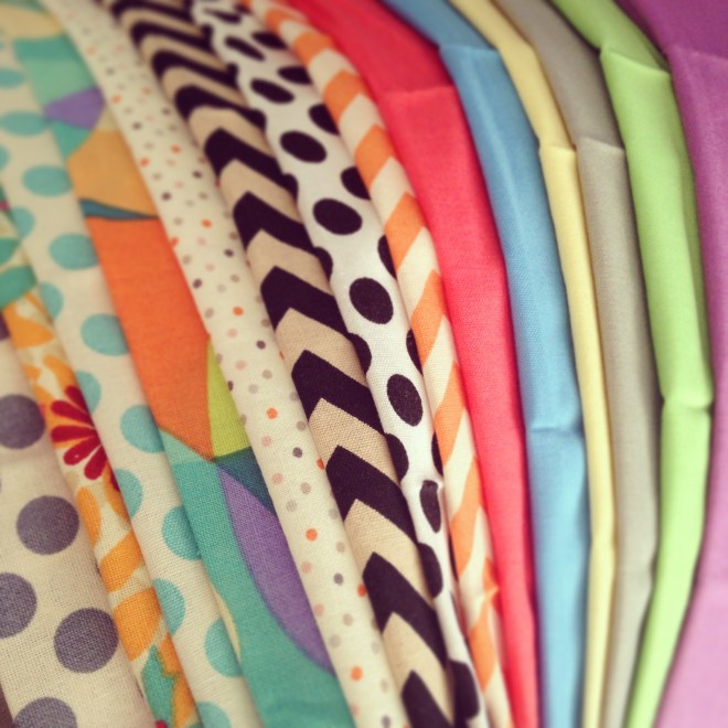 Prepping fabrics before ironing, cutting and piecing.